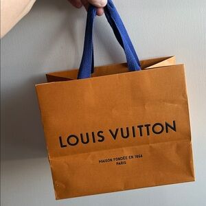 Louis Vuitton Bold Orange Bag with Blue Handles